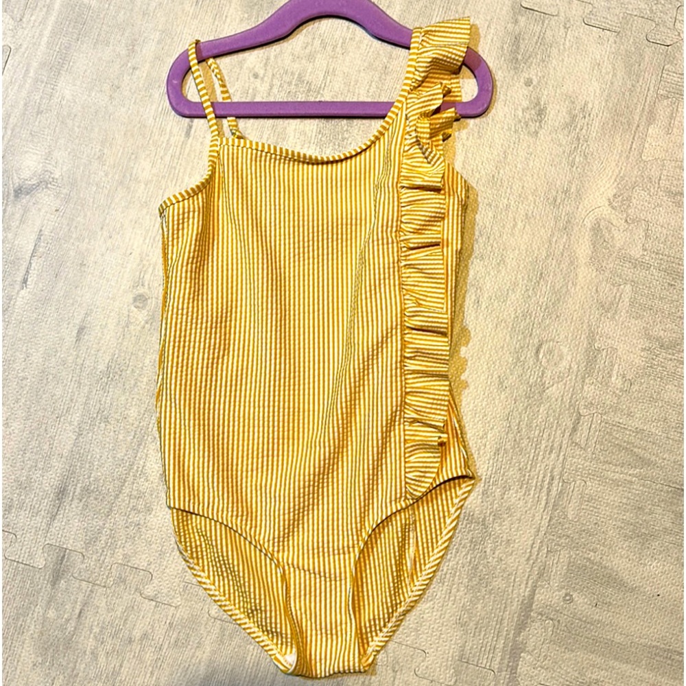 Girls Zara one piece bathing suit with ruffle detail.